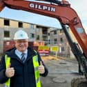 North Devon MP Ian Roome at the recent demolition of the old staff accommodation at North Devon District Hospital – he has welcomed the investment in new buildings but says much more needs to be done.