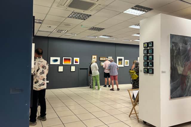 “We have made a presence for ourselves, and we have given ourselves the confidence to be able to do workshops and show our work to the public. And how scary is that? I can tell you, it was really scary yesterday at 12:30pm when we didn’t have anything up on the walls!