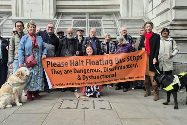 Marilyn Lant and guide dog Milly join floating bus stop campaigners to present petition in Downing Street 