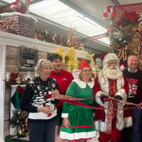 Santa cuts ribbon at Exeter Garden Centre's first Christmas department