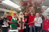 The store’s Christmas department was opened at the weekend by Santa and his elf