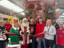 The store’s Christmas department was opened at the weekend by Santa and his elf