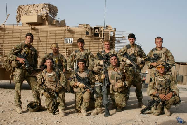 Adam Lison alongside members of his unit on Op Herrick 12.
