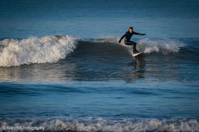 Adam has had a life-long passion for surfing.