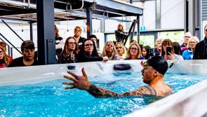 Olympic gold medalist takes a dip...  in Exeter showroom!