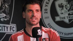 Tristan Crama signs for the Grecians