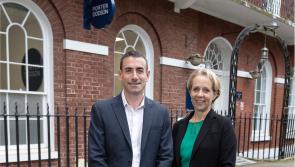 Law firm expands as business booms