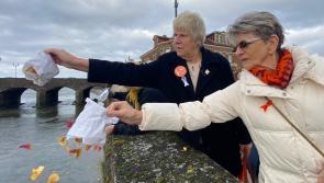 Poignant Barnstaple petal scattering in memory of victims of domestic violence