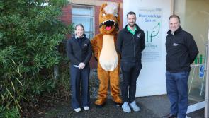 Exeter Racecourse mascot delivers Christmas gifts to children&rsquo;s ward after charity raceday

