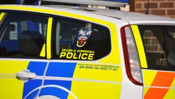 Police confirm driver reported to court after two-car collision near Exeter
