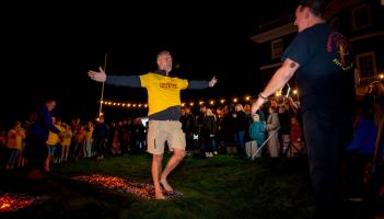 Exeter fundraisers brave the flames to raise over £20,000 for Hospiscare
