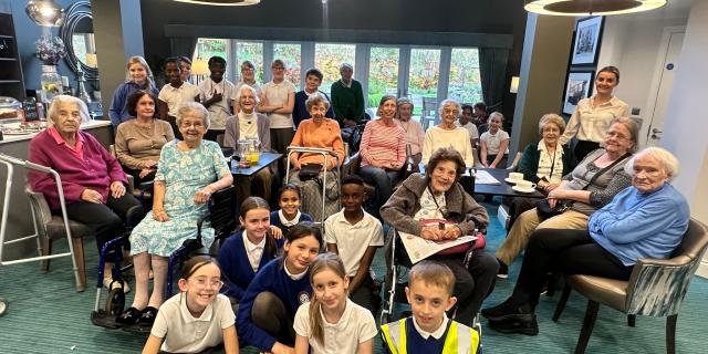 Exeter pupils meet 106-year-old former headteacher during care home community visit