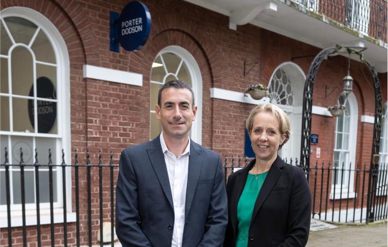 Law firm expands as business booms