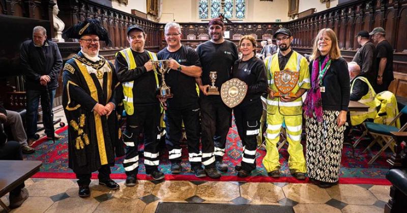 The workers with their awards