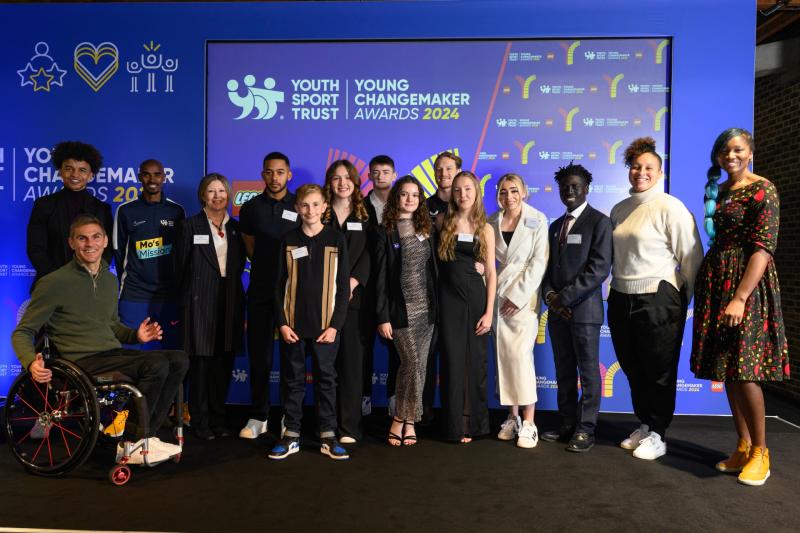 Sir Mo Farah CBE (left) with Tegan and Madeleine (middle) at the Young Changemaker Awards 2024