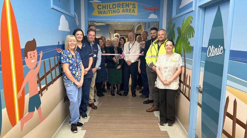 Trustees, hospital staff, and contractors open the new children’s outpatient department at RD&E Hospital. Image: Royal Devon Hospitals Charity