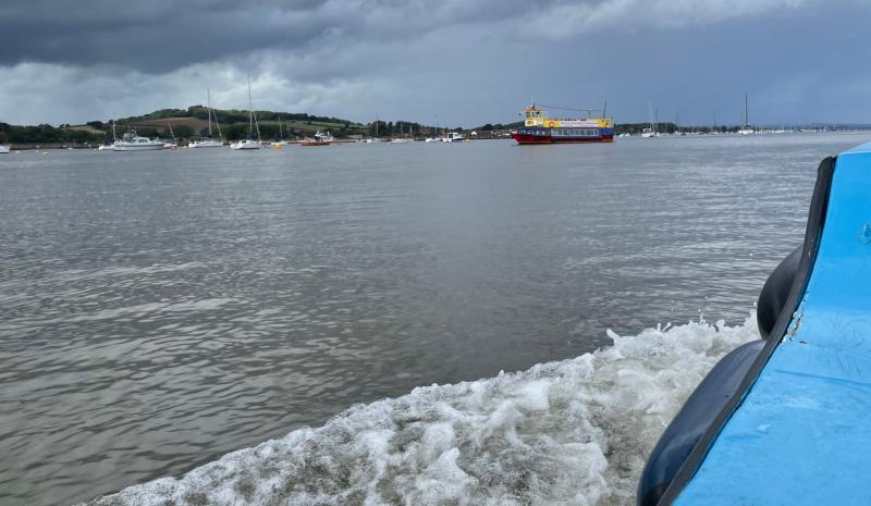 An electric boat is being put through its paces on the Exe