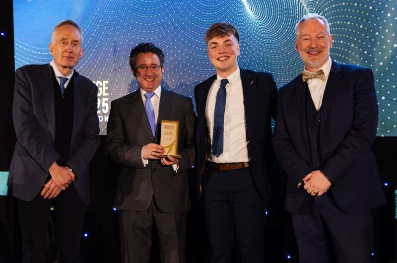 Rob Stevens presenting the award to Josh Tate, Image: Exeter College