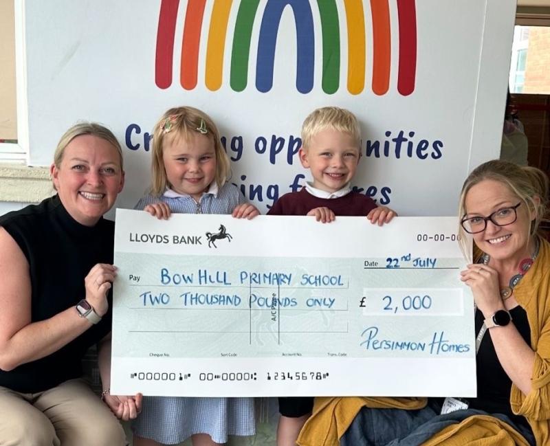 Bowhill school pupils with their cheque