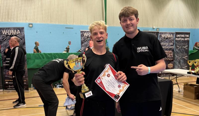 Harris Sawyer holding the trophy
