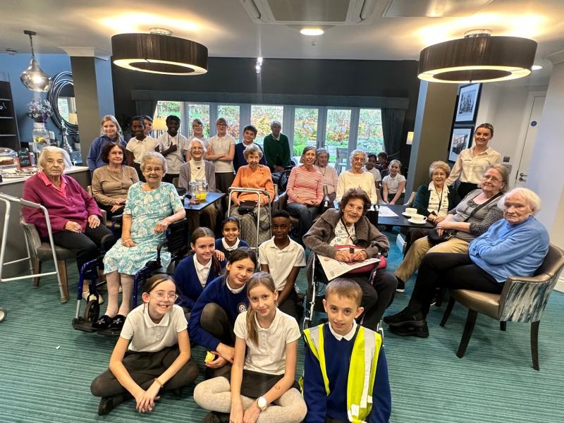 Exeter pupils meet 106-year-old former headteacher during care home community visit