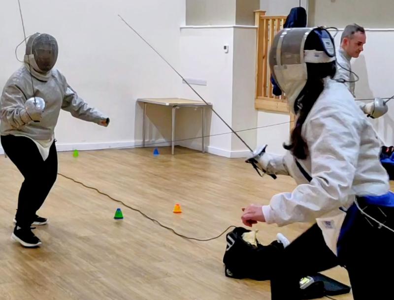 Beginners Audrey and Sally fencing Sabre. Pic from Jason P Ball