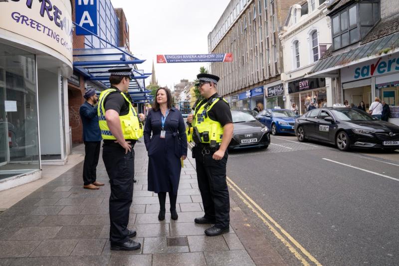 Alison Hernandez with police in Torquay